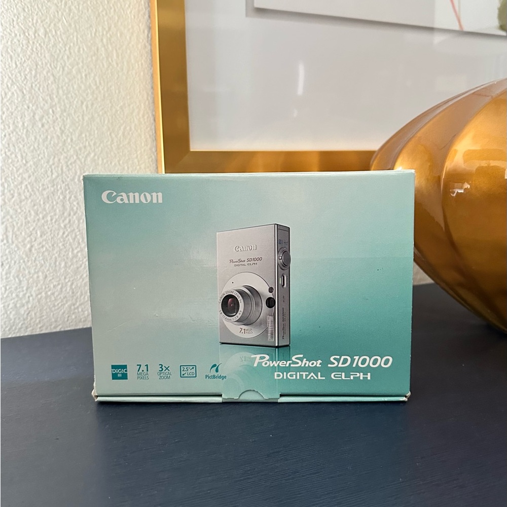 Canon PowerShotnSD1000 Digital ELPH Camera *like new*